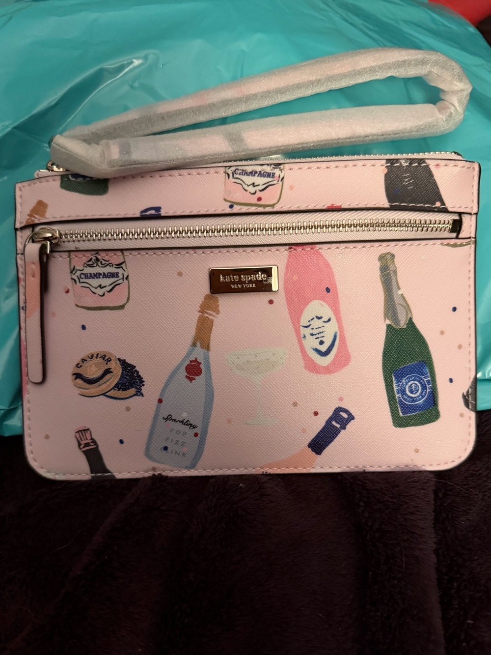kate spade pink champagne bottle print wristlet
